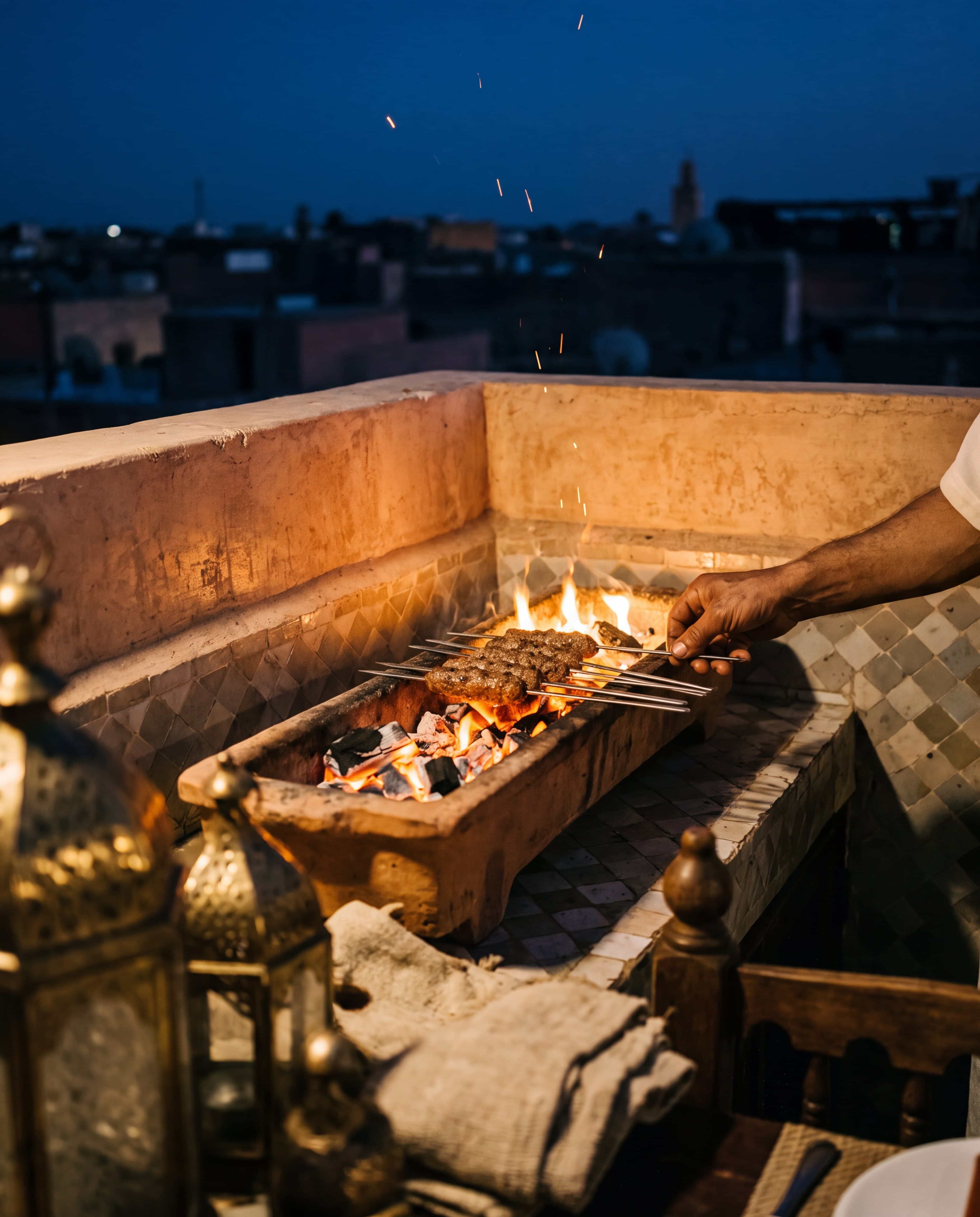 Kefta skewers grilling over coals